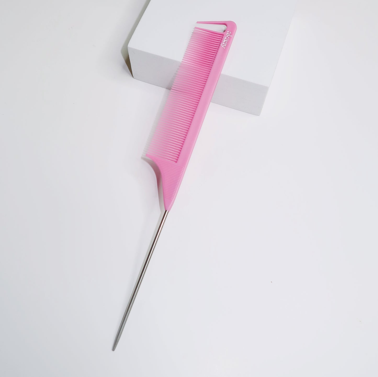 pink rat tail comb