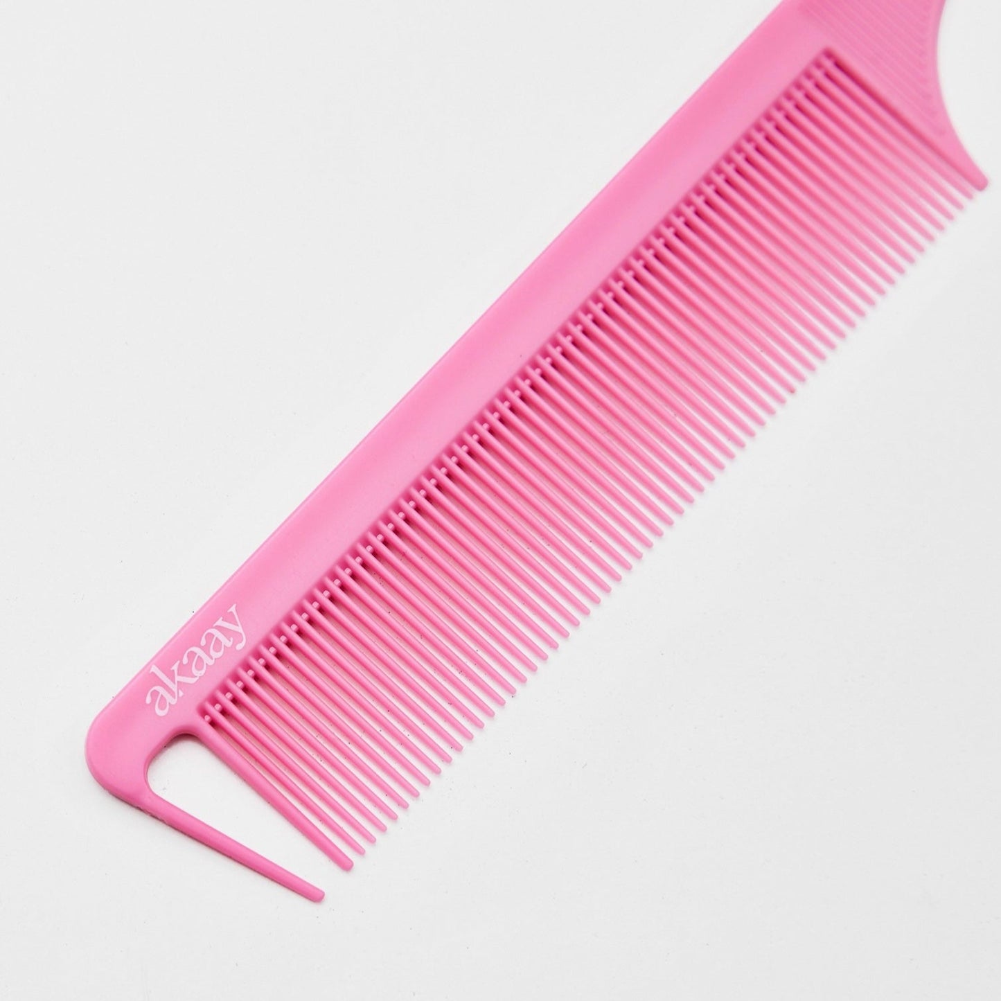 pink rat tail comb